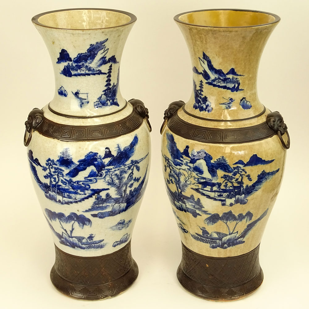 20th Century Chinese Guangxu style pottery vases with raised enamel foot, bands and mock figural ring handles. 
