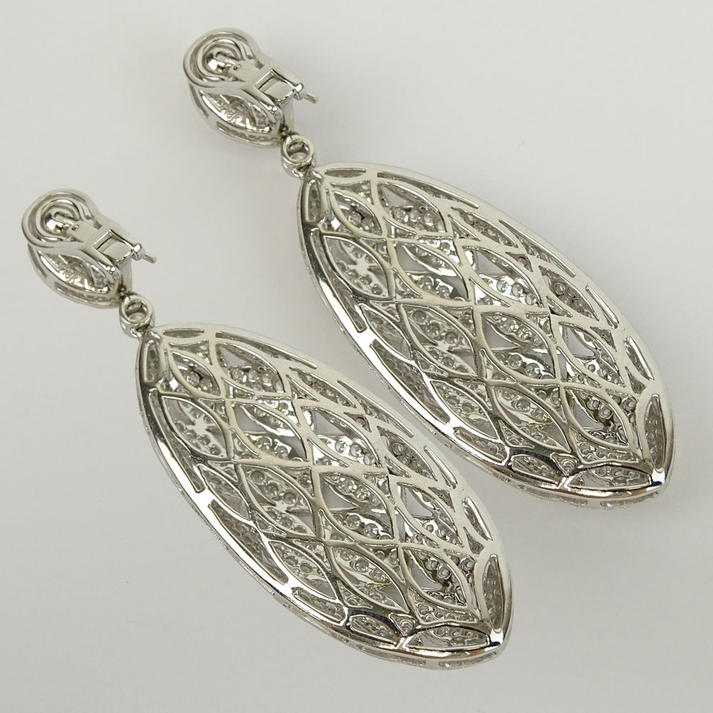 Diamond and 18 Karat White Gold Dangle Earrings Set with Approx. 6.60 Carat Round Brilliant Cut Diamonds.