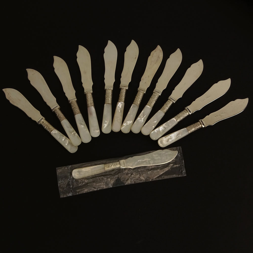 Twelve (12) Vintage Sheffield Silver Plate and Mother of Pearl Butter Knives.