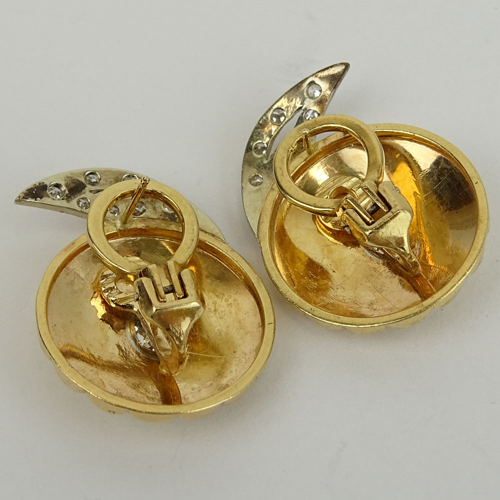 Pair of Vintage 14 Karat Yellow Gold Button style Earrings Set with Approx. 1.20 Carat Marquise Cut Diamonds and further accented with Round Brilliant Cut Diamonds.