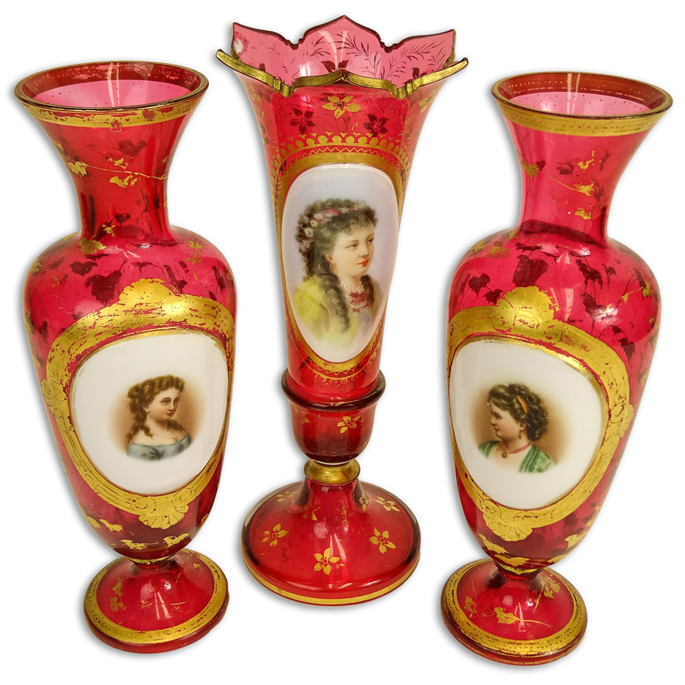 Three (3) Bohemian Cranberry Glass Portrait Vases.