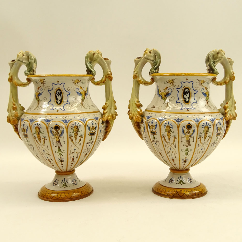 Pair of Antique Ginori Majolica Urns. Chimera handles.