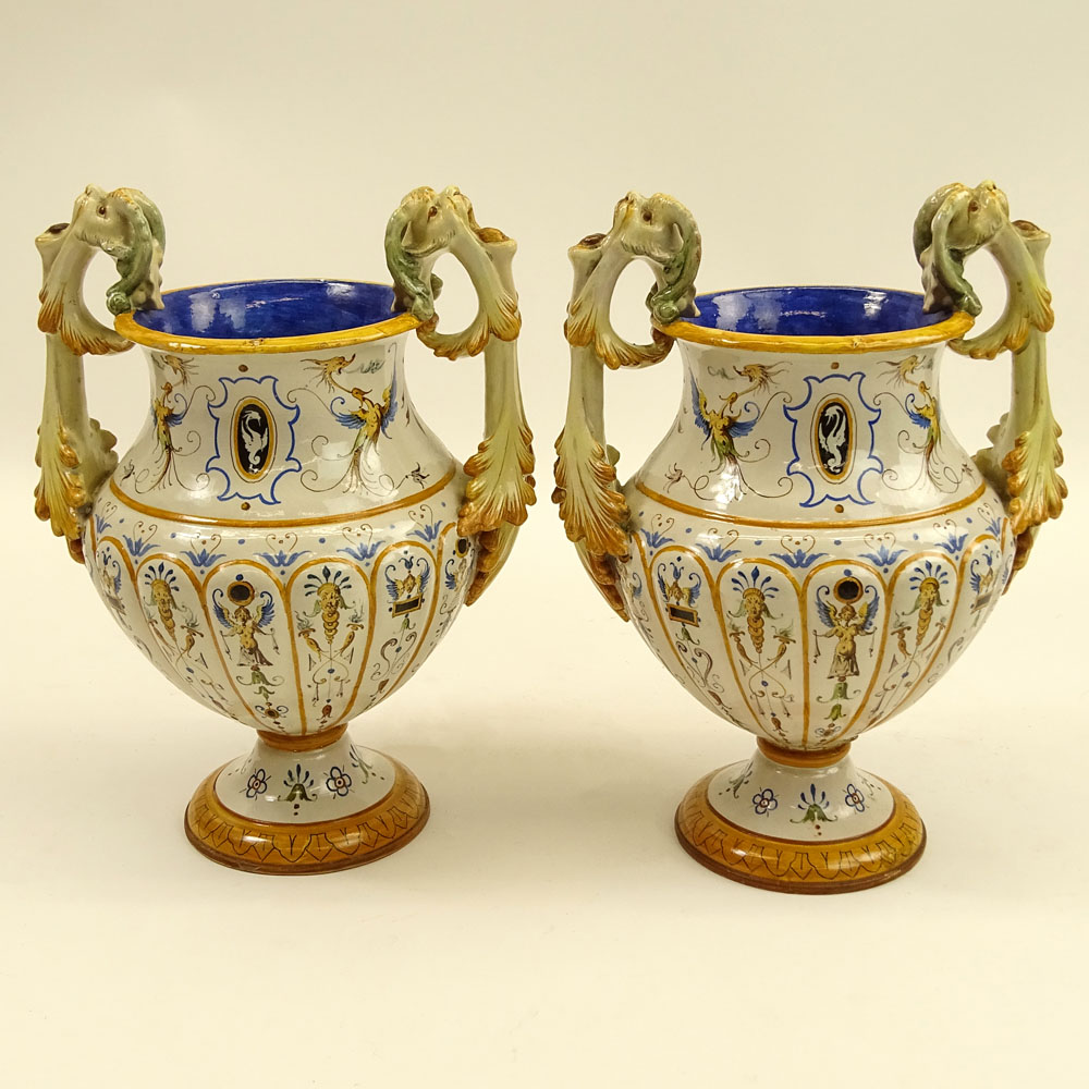Pair of Antique Ginori Majolica Urns. Chimera handles.