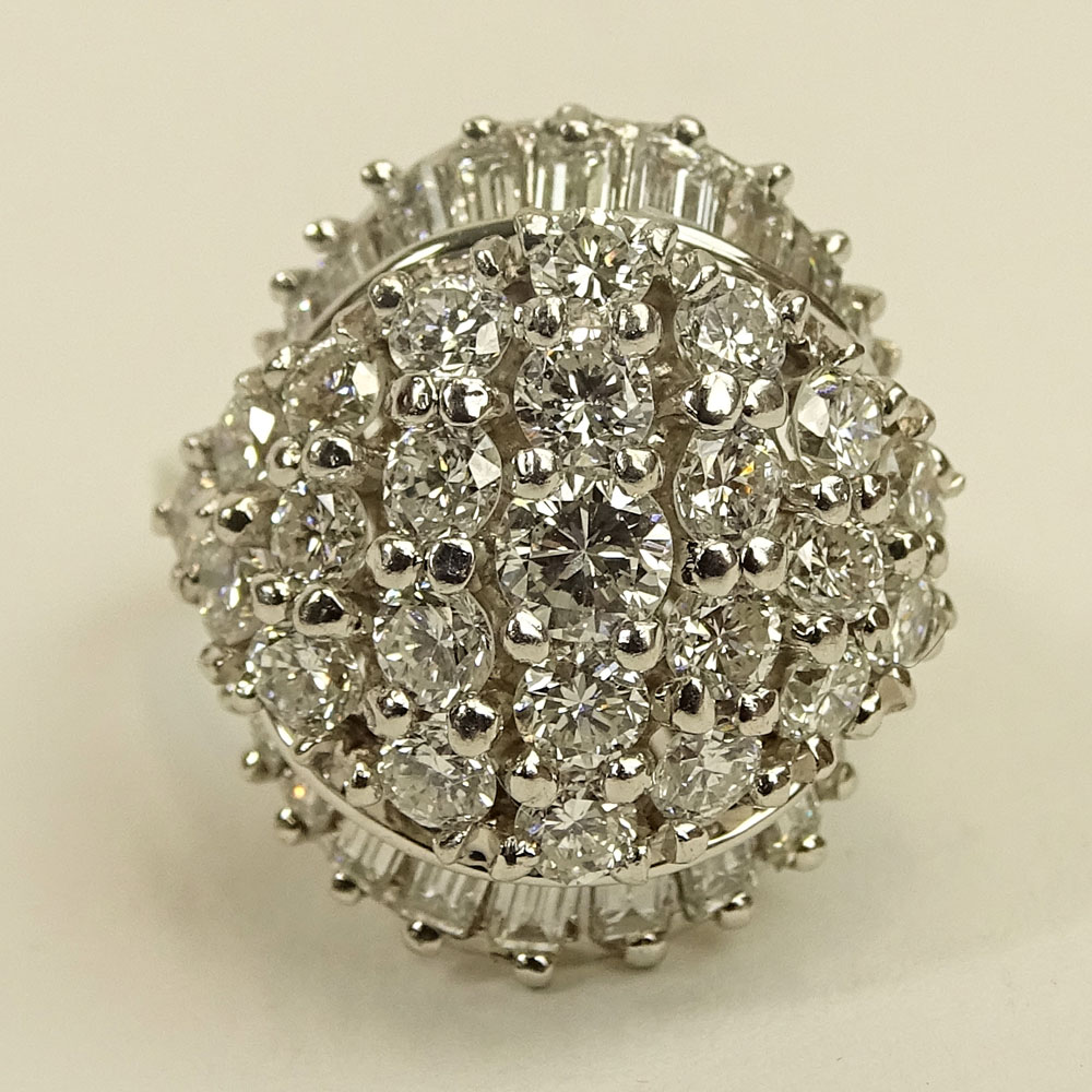 Lady's Vintage Approx. 3.50 Carat Round Brilliant Cut and Baguette Cut Diamond and 14 Karat White Gold Dome Ring.