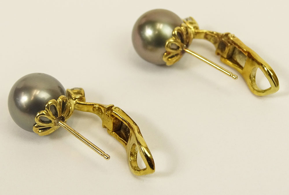Lady's South Sea Grey Pearl, Diamond and 18 Karat Yellow Gold Earrings. 