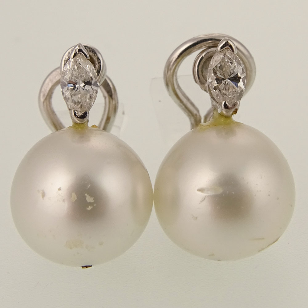 Assembled Four (4) Piece Pearl, Diamond and White Gold Suite Including Ring, Pair of Earrings and Pendant. 