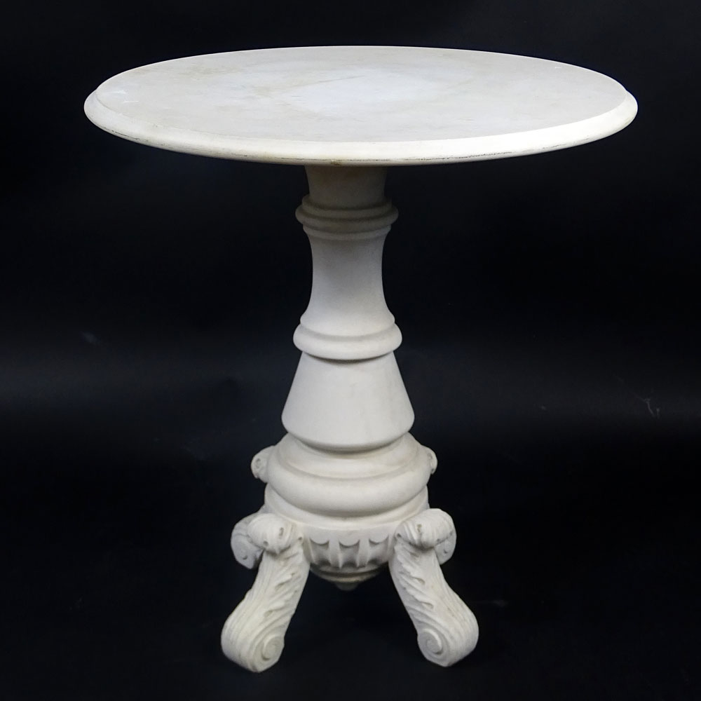 Antique Italian Carved Carrera Marble Occasional Table. Top on baluster pedestal with foliate legs.