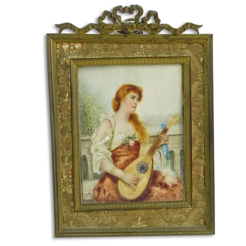 Antique hand painted ivory portrait miniature in bronze and fabric frame.