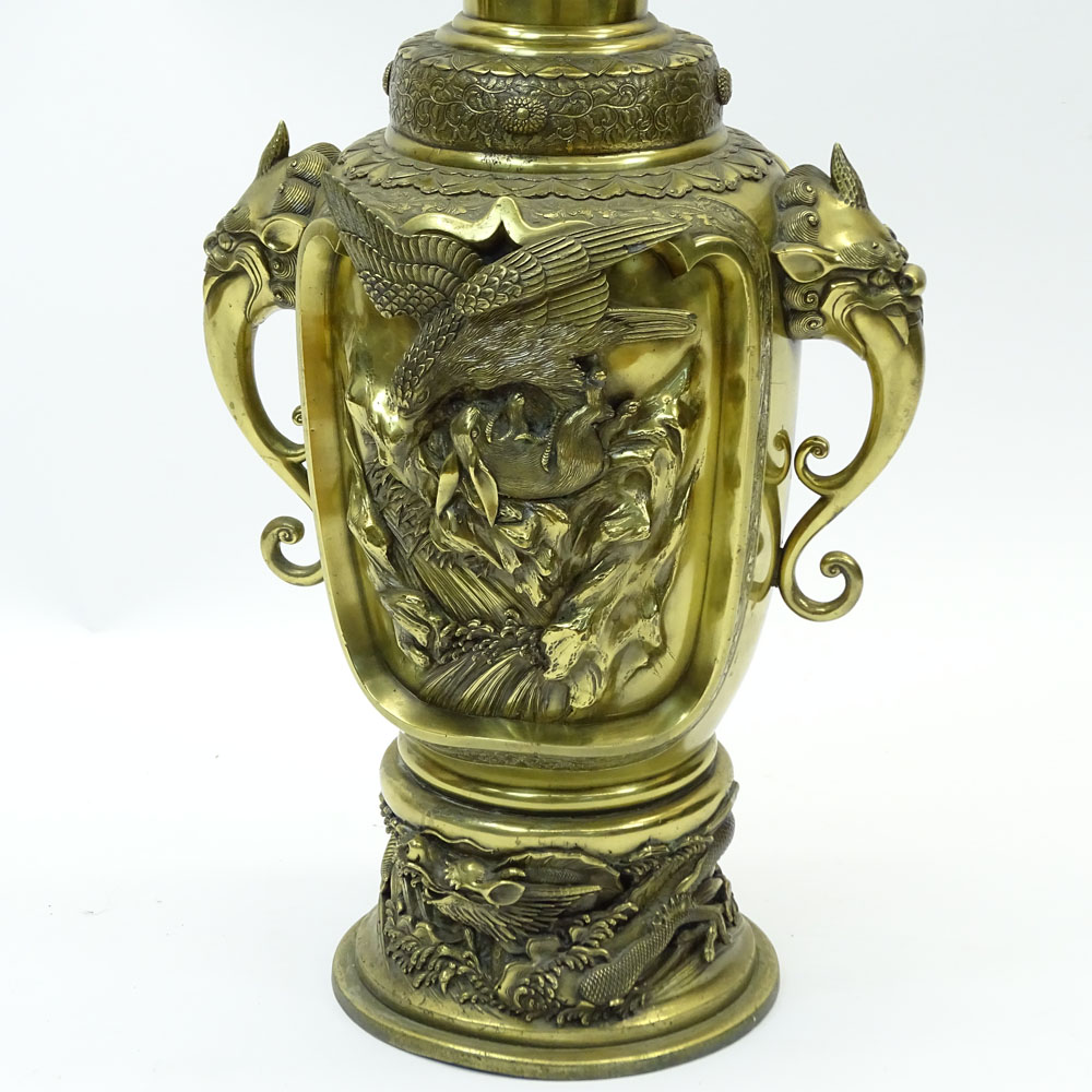 Large Meiji Japanese Bronze Urn. Decorated in high relief of Birds, Chickens, flowers. Foo lion figural handles. 