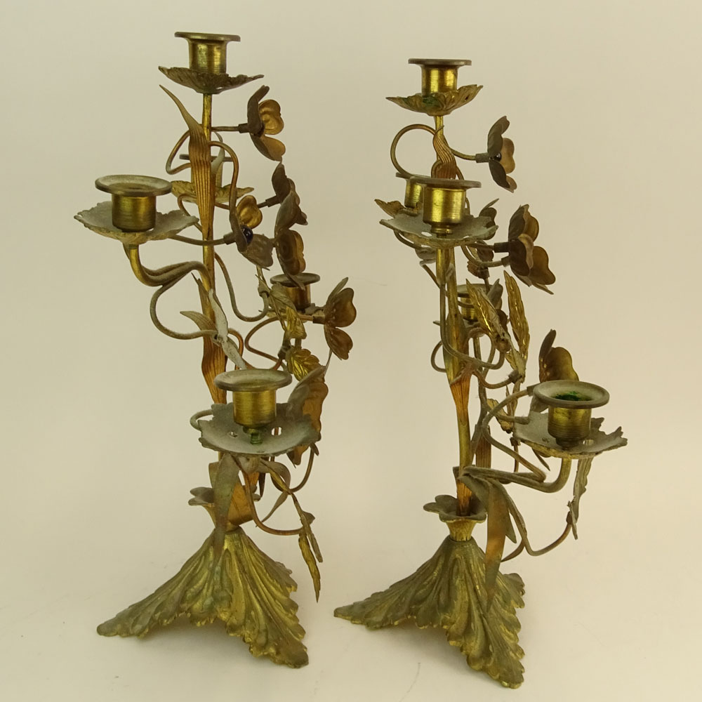 Pair of Antique French Jeweled Bronze/Brass Candelabra. Each with 5 lights and a floral motif.