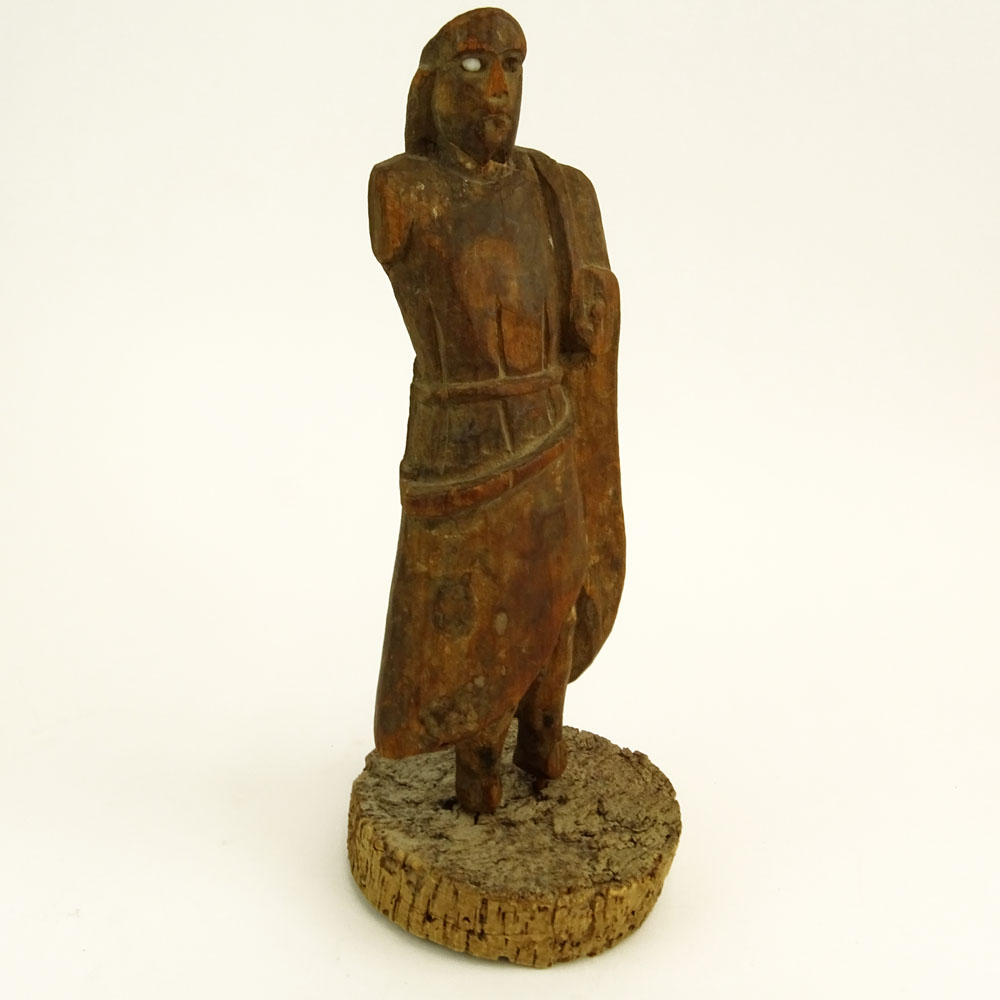 Early Continental Wood Carving of a Man on Cork Base.