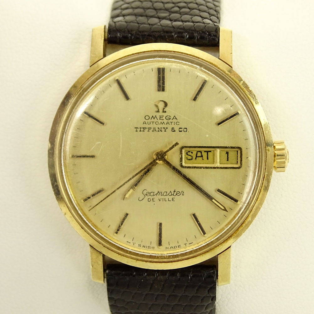 Vintage Men's Omega 14 Karat Yellow Gold Seamaster de Ville Automatic Movement Watch with Lizard Strap.