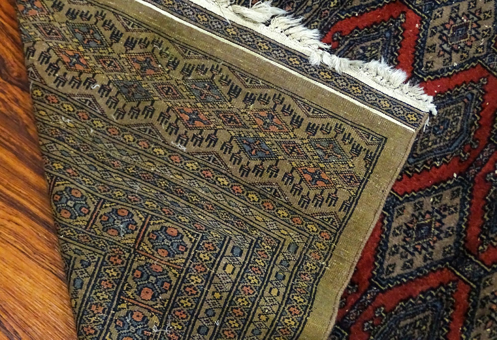 Semi Antique Persian Bokhara Rug.