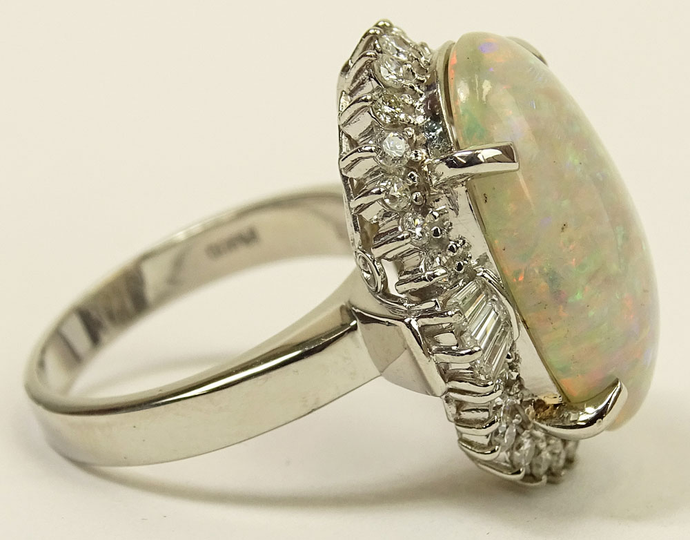Lady's Approx. 8.31 Carat Oval Cut White Opal, .86 Carat Diamond and Platinum Ring. 