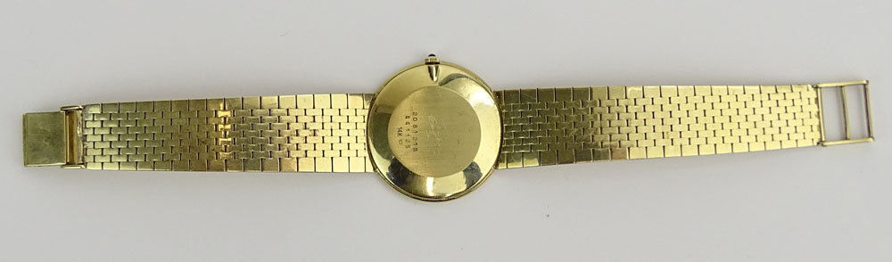 Men's Vintage Concord 14 Karat Yellow Gold Bracelet Watch with Quartz Movement.