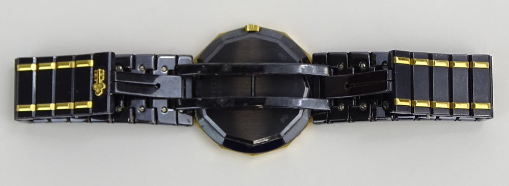 Men's Vintage Corum Stainless Steel and 18 Karat Yellow Gold Admiral's Cup Quartz Movement Bracelet Watch.