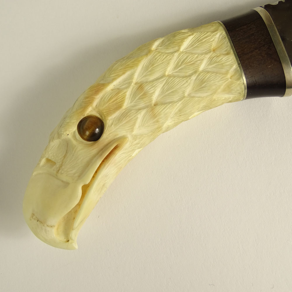 Three piece lot of ivory. Included a carved Ivory handled hunting knife in an eagle motif with tigers eye