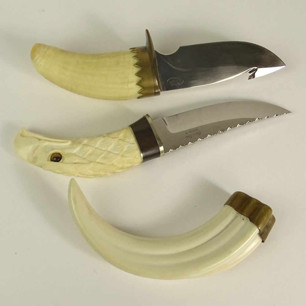 Three piece lot of ivory. Included a carved Ivory handled hunting knife in an eagle motif with tigers eye