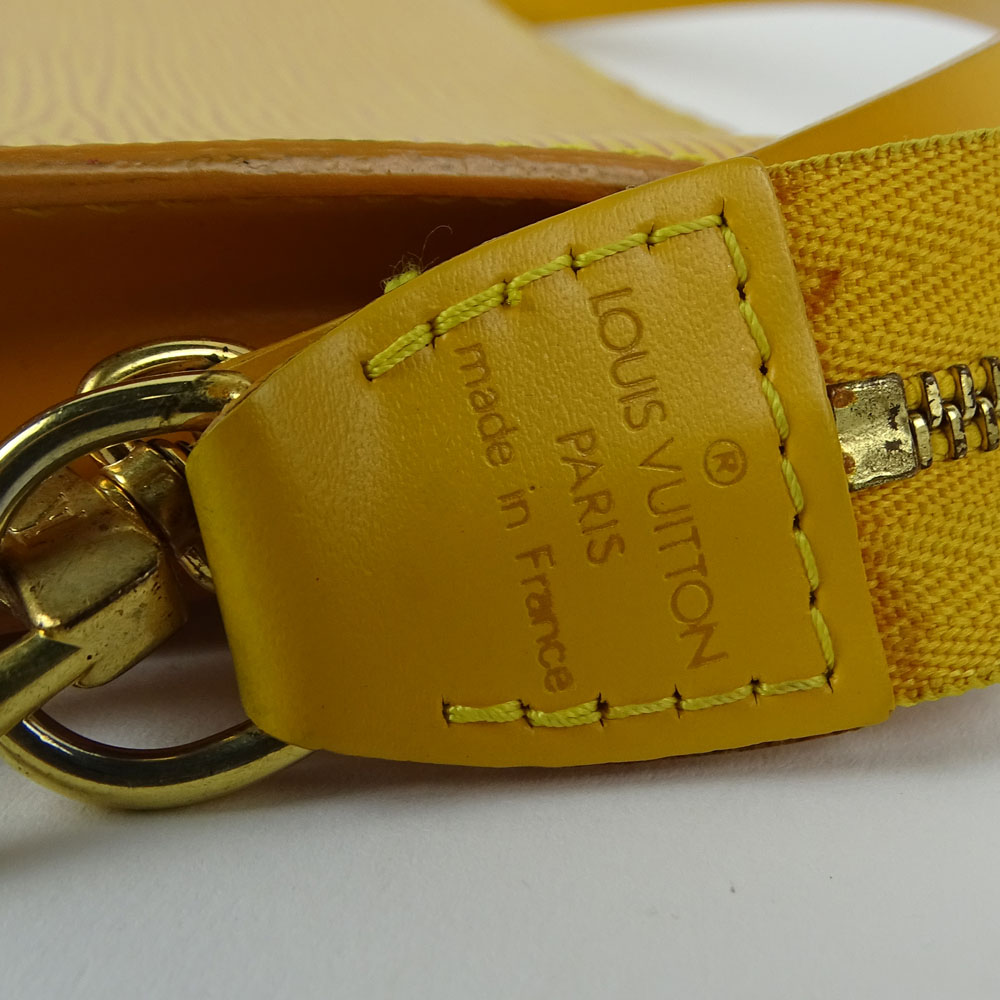 Nice Pre-Owned Louis Vuitton Yellow Leather Wristlet clutch handbag.