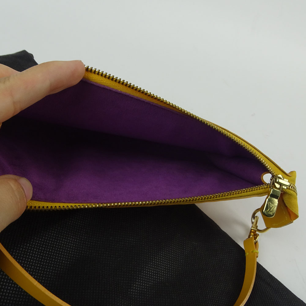 Nice Pre-Owned Louis Vuitton Yellow Leather Wristlet clutch handbag.