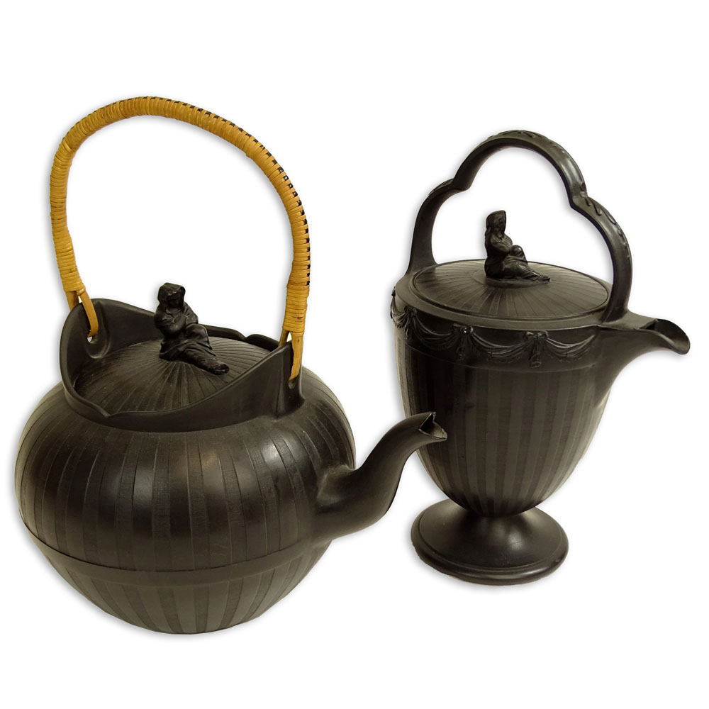 Two Antique Wedgwood Black Basalt Teapots. Both with seated figural finials.