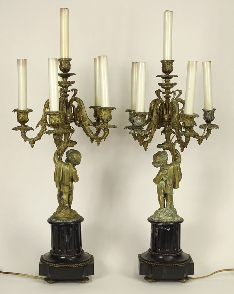 Pair French Louis XVI Style Bronze Putti Candelabra Table Lamps. Each was fashioned in the form of a five-arm candelabra
