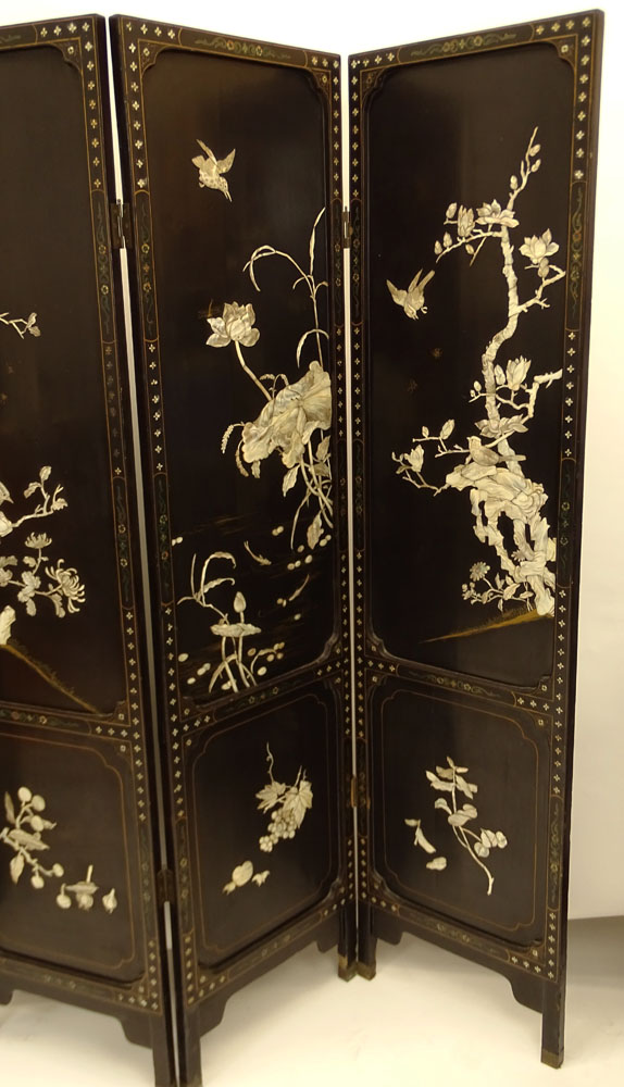 Vintage Chinese Lacquered Inlaid and Applied Mother Of Pearl Four paneled Screen.