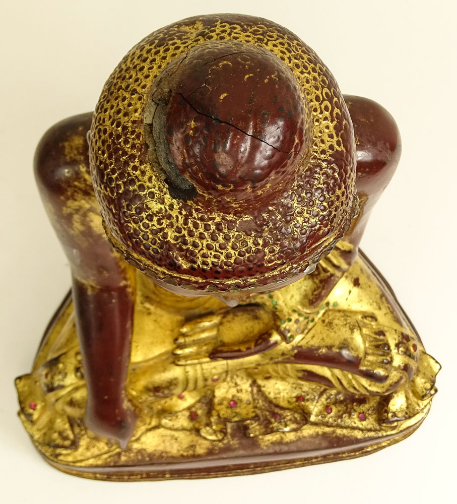 Antique Chinese Bronze of Seated Buddha. Losses to top of head reveal a very old bronze.