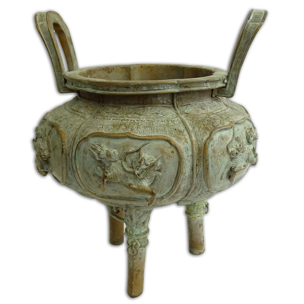 Antique Chinese Bronze Censer. Well done raised mythical beasts motif.