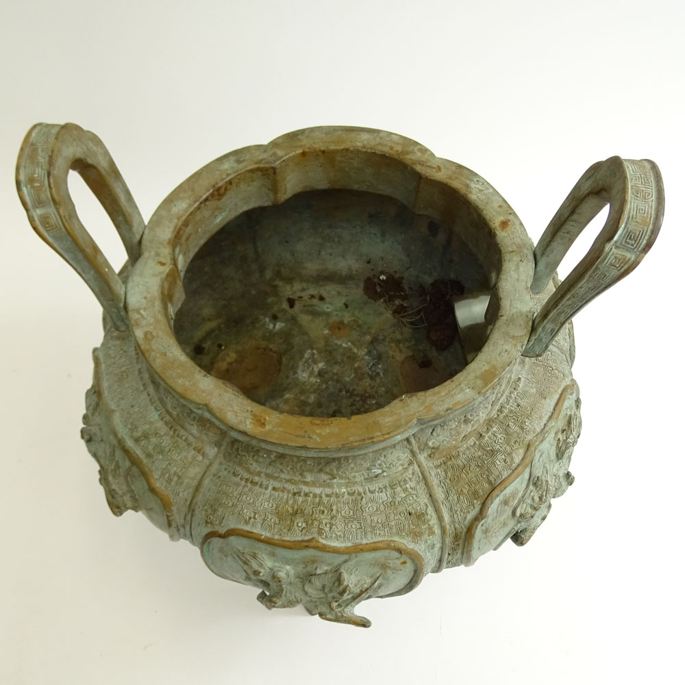 Antique Chinese Bronze Censer. Well done raised mythical beasts motif.