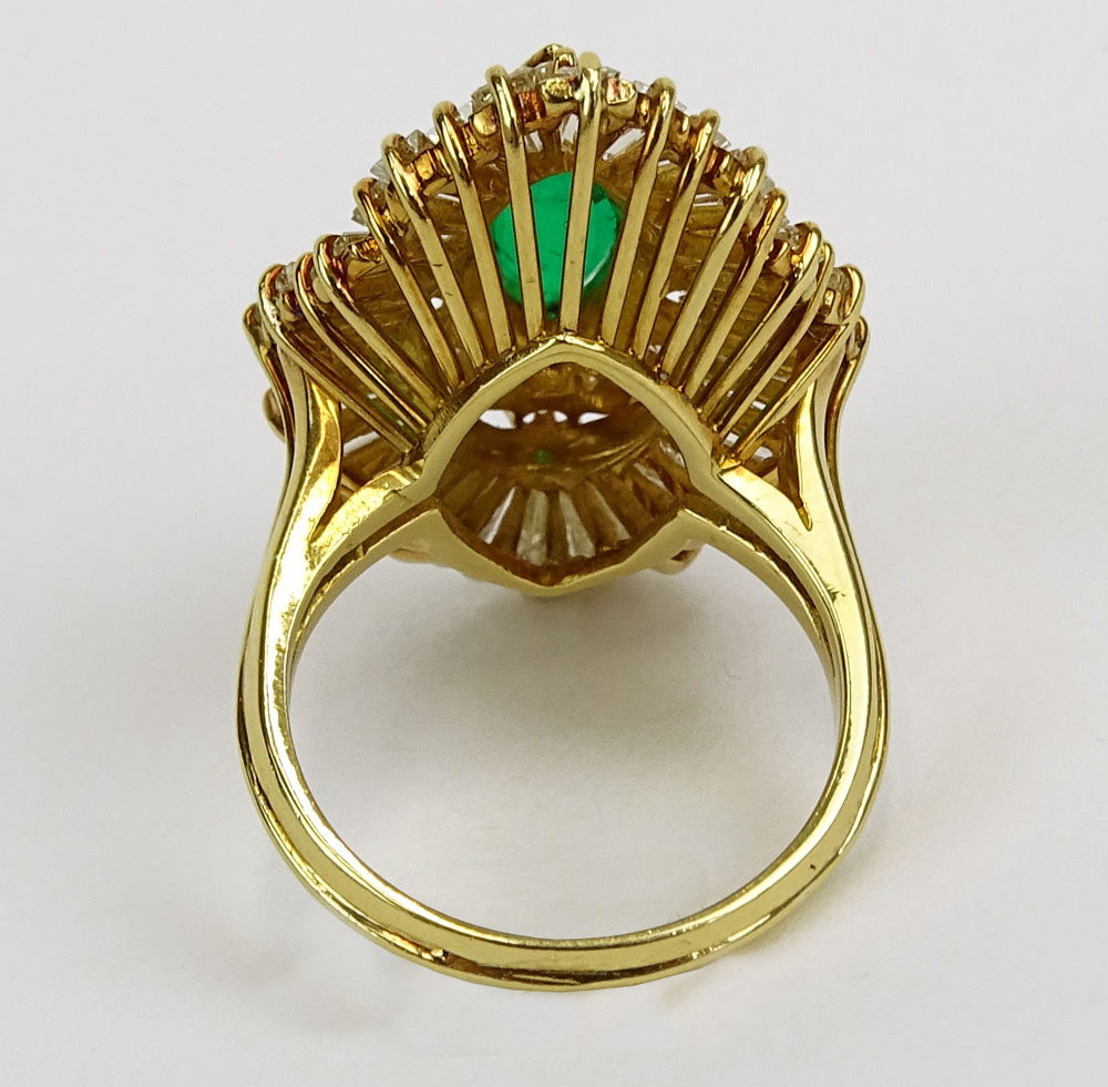 Lady's Approx. 3.75 Carat Colombian Muzo Mine Marquise Cut Emerald, 1.75 Carat Round and Baguette Cut Diamond and 18 Karat Yellow Gold Ballerina Ring. 