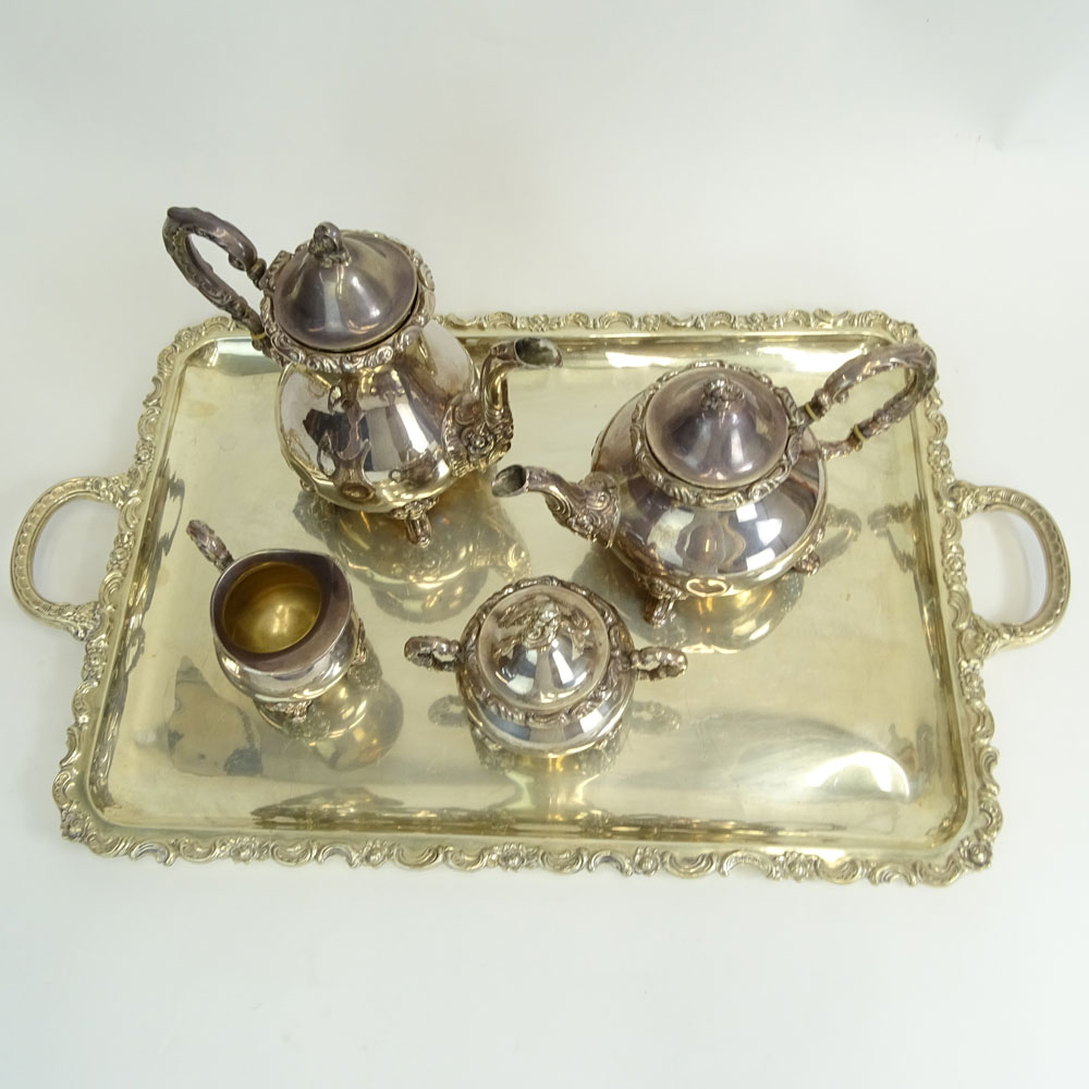 Four (4) Piece Sterling Silver Tea Set on Silver Plate Tray. Includes coffee pot, tea pot, creamer and sugar bowl. 