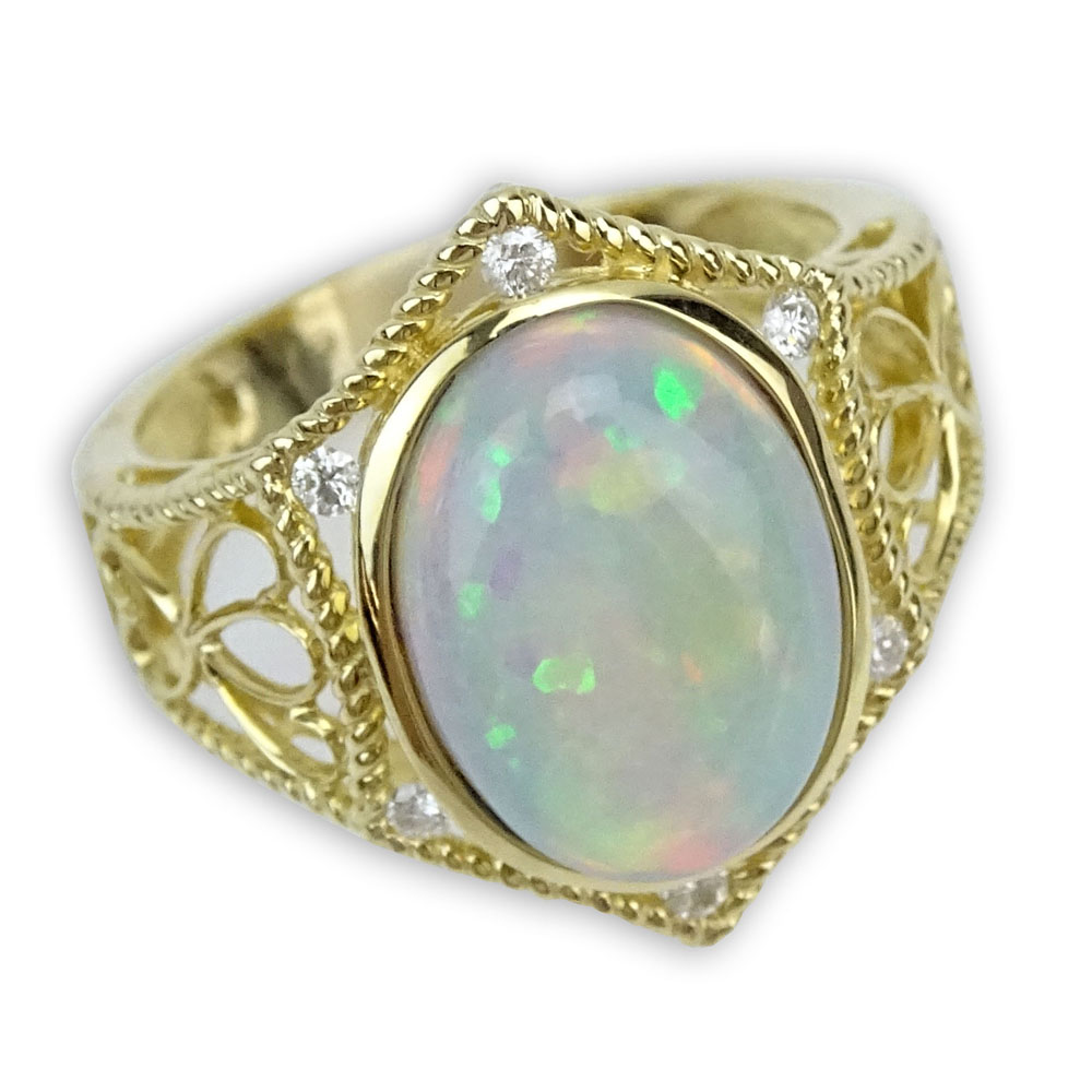 Approx. 4.03 Carat White Opal, Diamond and 14 Karat Yellow Gold Ring