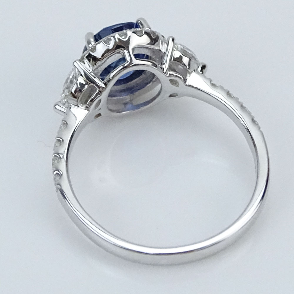 1.99 Carat Oval Cut Sapphire, .64 Carat Diamond and 18 Karat White Gold Ring