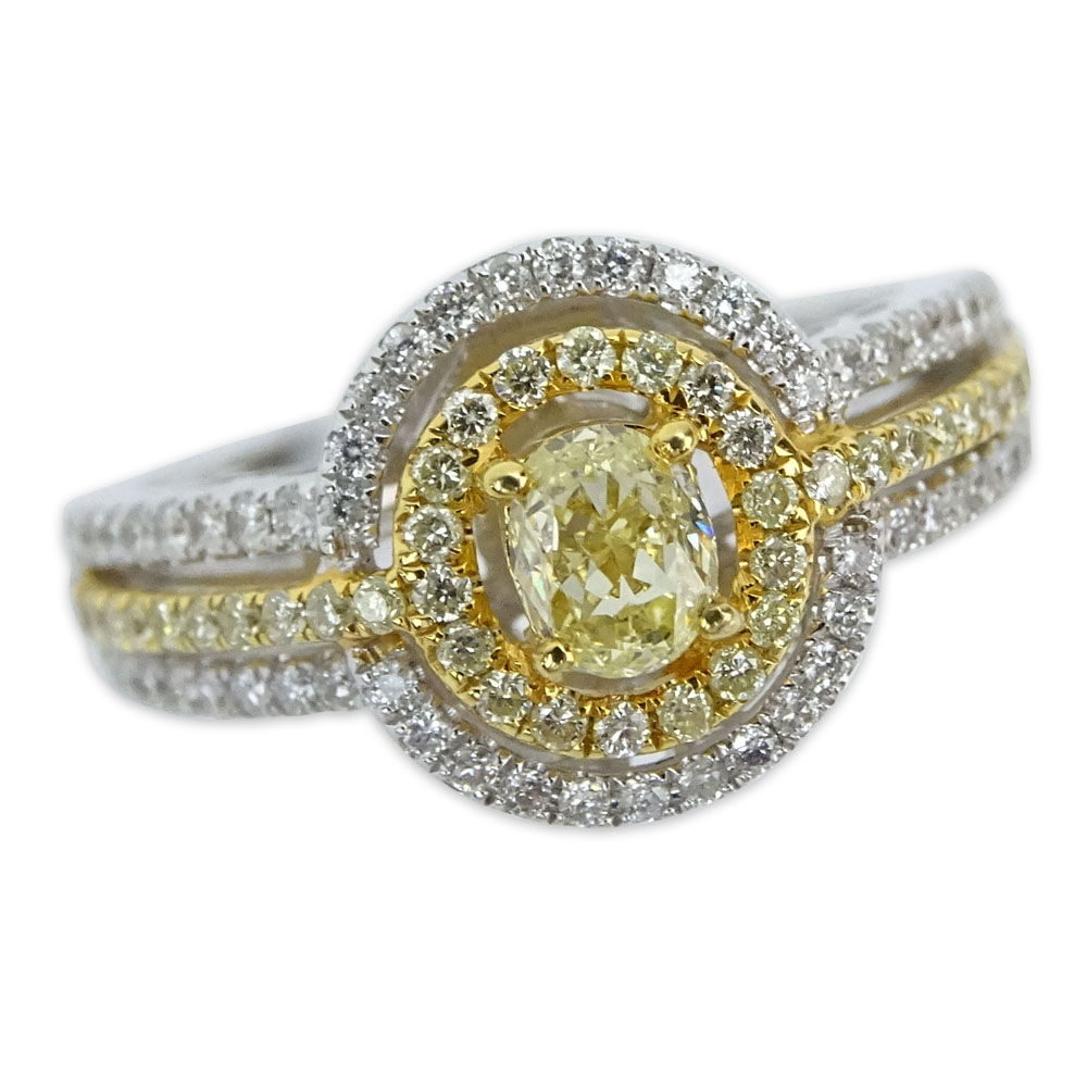 Approx. .80 Carat Fancy Yellow Diamond, .30 Carat Round Cut Diamond and 18 Karat White Gold Ring