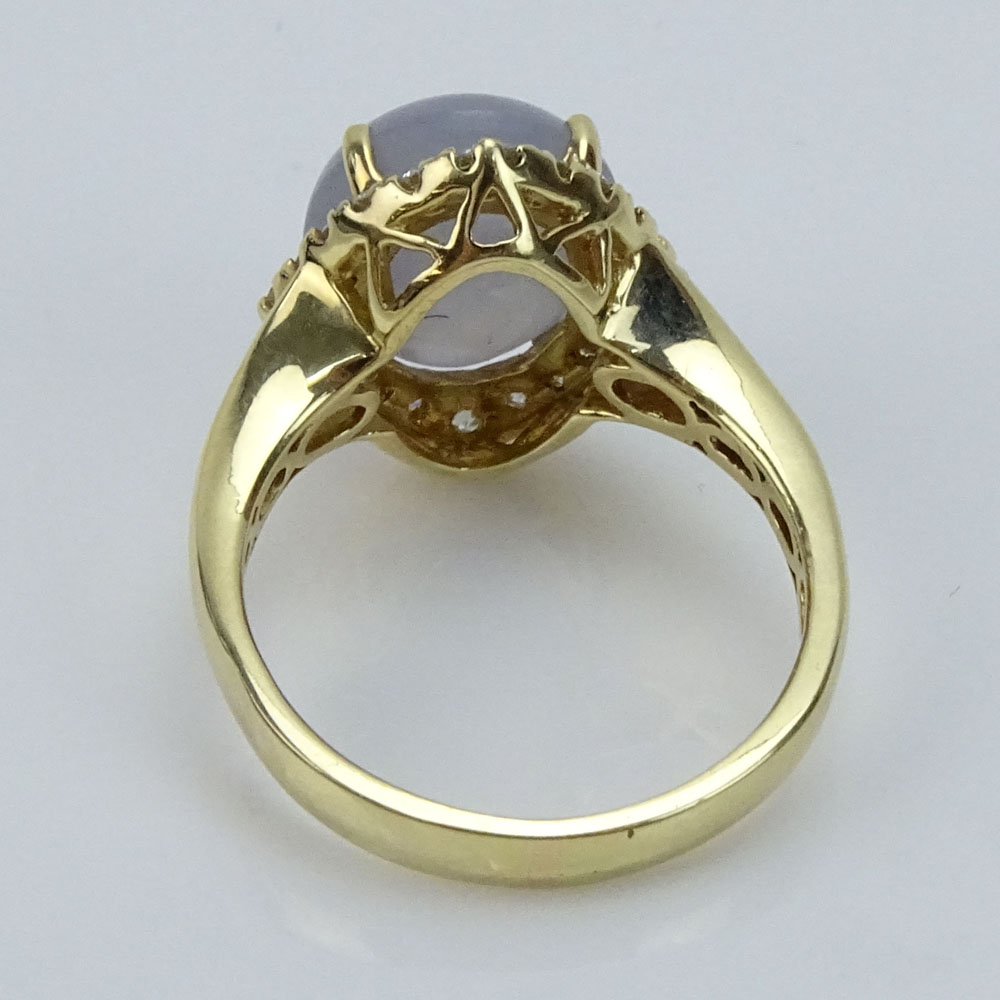 Approx. 4.11 Carat Star Sapphire, .63 Carat Round Brilliant Cut Diamond and 14 Karat Yellow Gold Ring