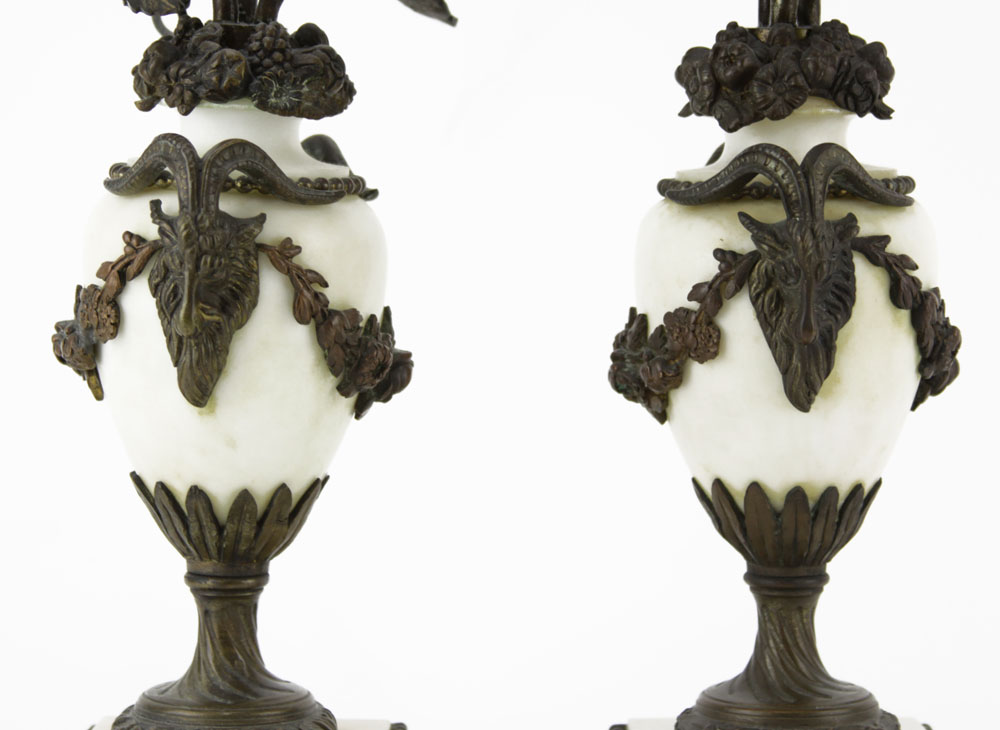 Pair of 19/20th Century Bronze Mounted Marble Urn Shaped Candelabra. Figural and floral mounts