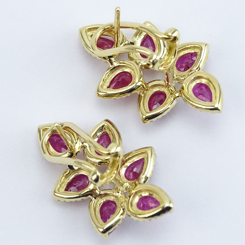 Pair of Approx. 5.12 Carat Pear Shape Ruby and 18 Karat Yellow Gold Earrings