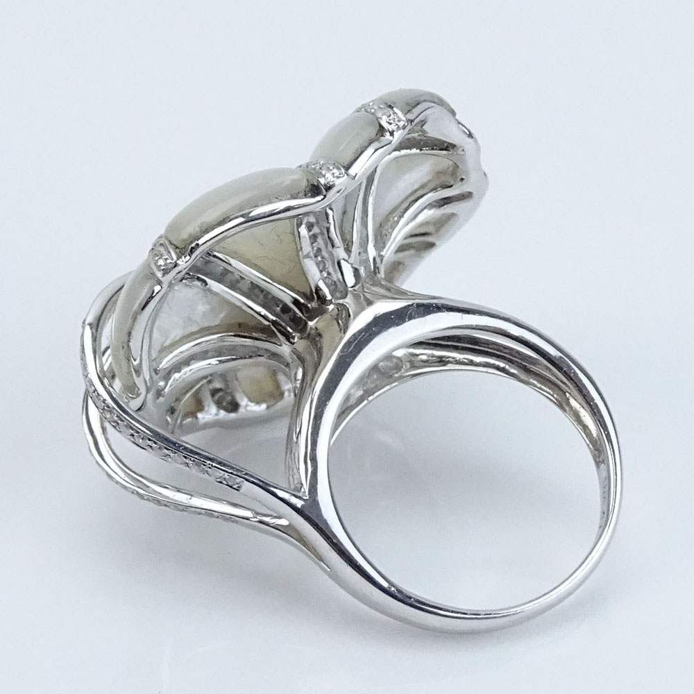 Approx. 11.60 Carat Opalescent Mother of Pearl, .75 Carat Round Cut Diamond and 18 Karat White Gold Flower Ring