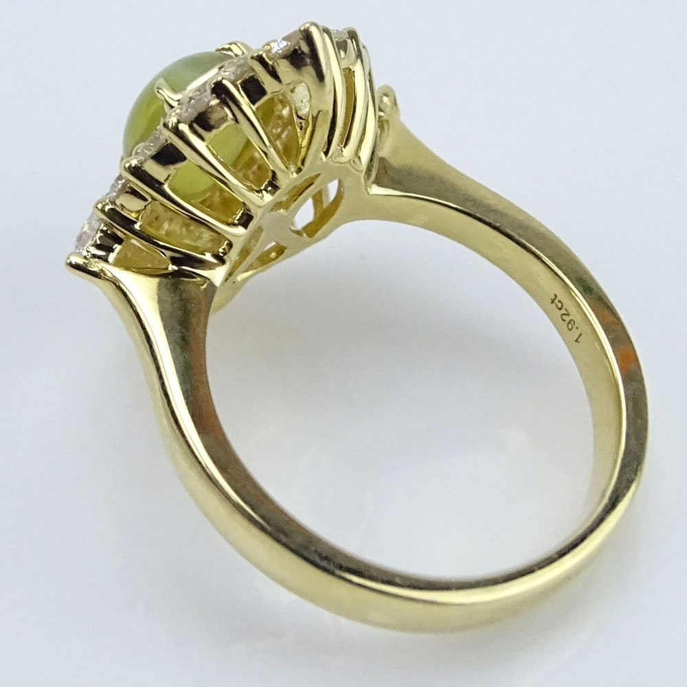 1.92 Carat Cat's Eye, .75 Carat Round Brilliant Cut Diamond and 18 Karat Yellow Gold Ring