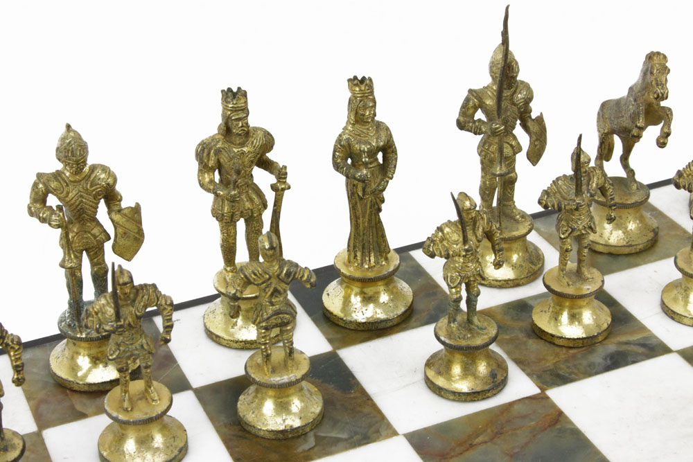 Giuseppe Vasari Italian, circa 1970 gilt metal figural chess set 