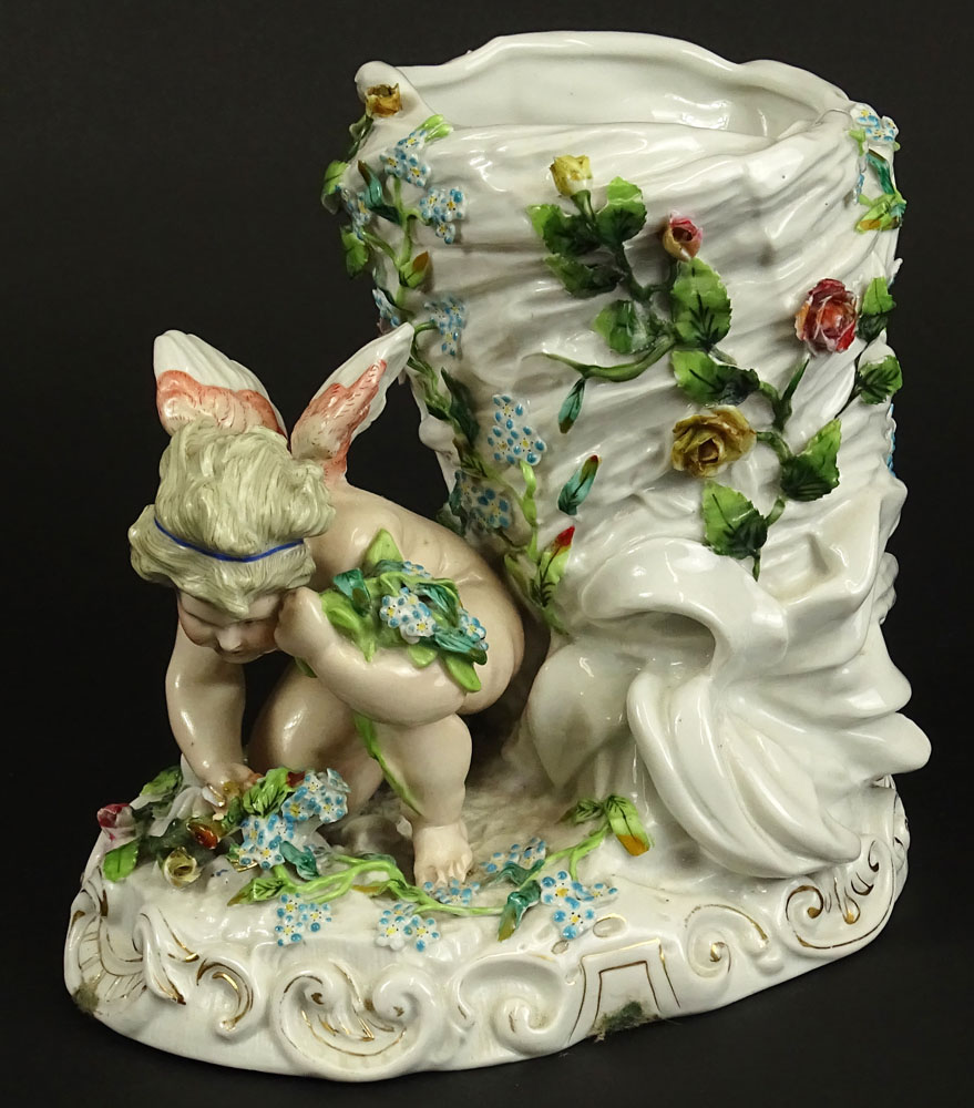 Antique Continental Meissen Style Porcelain Figural Vase. Decorated with Cherub and Flowers