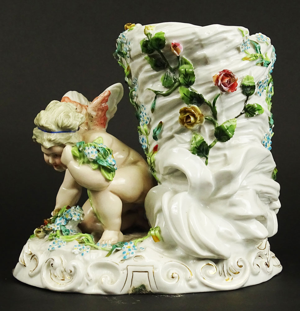 Antique Continental Meissen Style Porcelain Figural Vase. Decorated with Cherub and Flowers