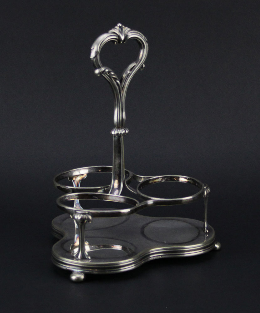 English Victorian Silver Plated and Crystal Tantalus/Cruet Set.