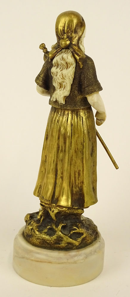 Theophile Francois Somme, French (1871-1952) Gilt bronze and ivory figure on marble base "Girl with Staff and Flag" 