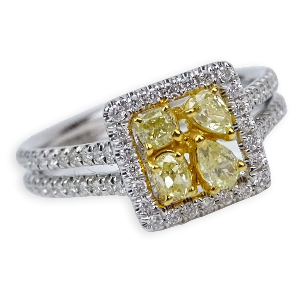 .47 Carat Fancy Yellow Diamond, .41 Round Cut Diamond and 18 Karat White Gold Ring.