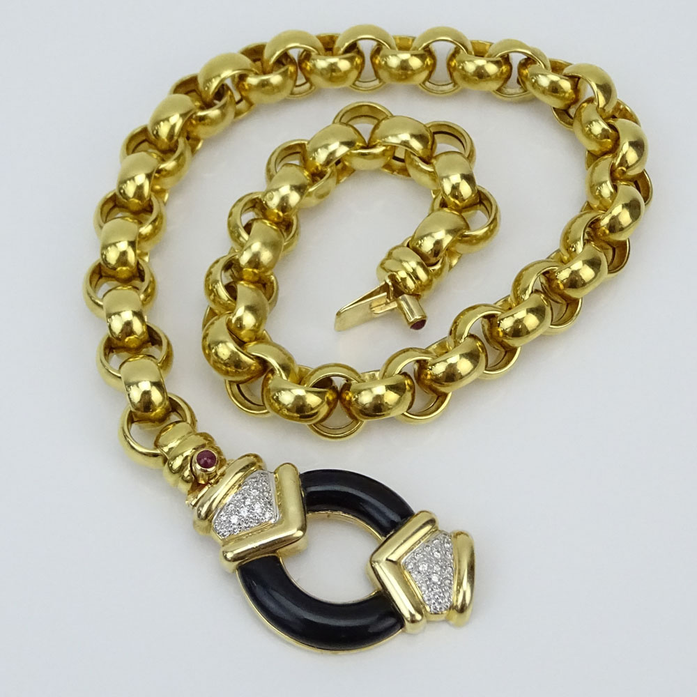 Vintage Italian Large and Heavy 14 Karat Yellow Gold, Pave Set Round Brilliant Cut Diamond and Black Onyx Pendant Necklace. 
