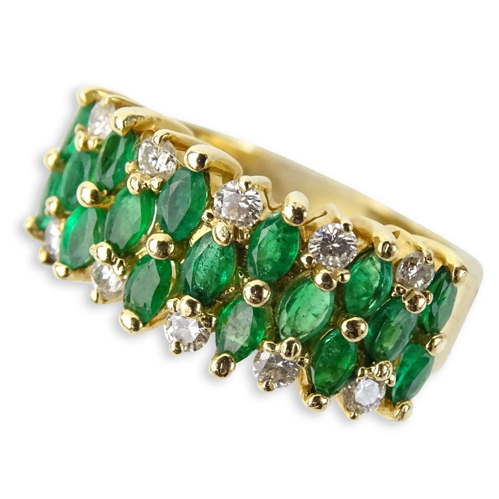 Vintage Oval Cut Emerald, Round Brilliant Cut Diamond and 14 Karat Yellow Gold Ring