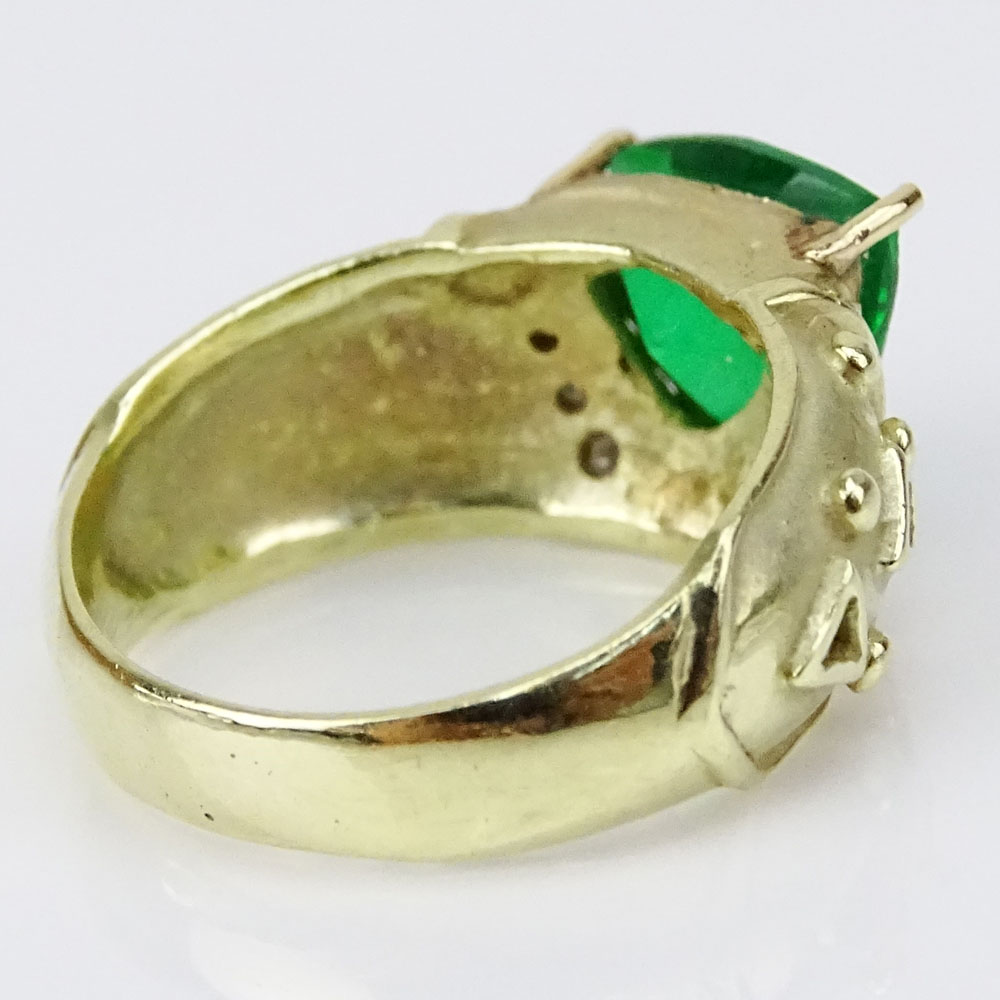 Synthetic Emerald and 14 Karat Yellow Gold Ring with Small Diamond Accents