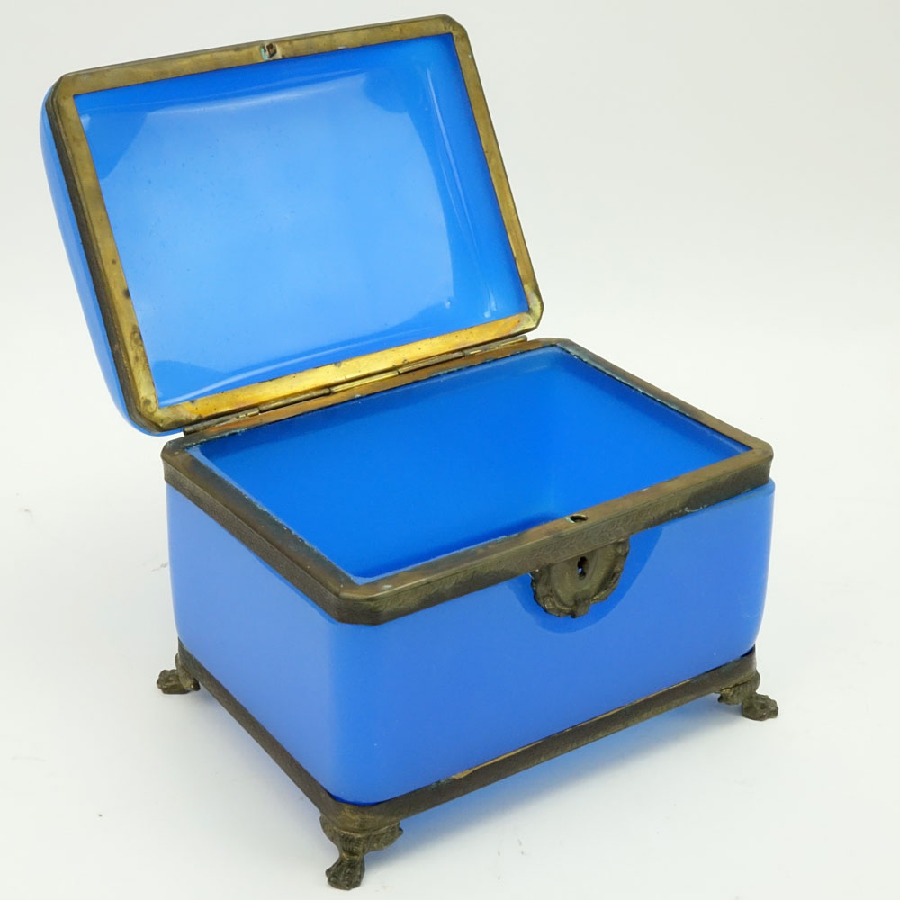 Large Antique Blue Opaline Glass Dresser Box. Brass hardware and footed.